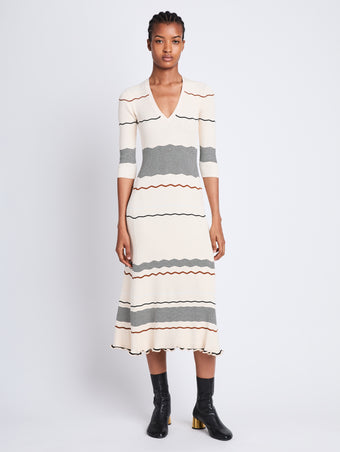 Front full length image of model wearing Wavy Stripe Rib Knit Dress in ECRU MULTI