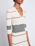 Detail image of model wearing Wavy Stripe Rib Knit Dress in ECRU MULTI