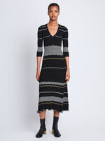 Front full length image of model wearing Wavy Stripe Rib Knit Dress in BLACK MULTI