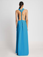 Back image of model wearing Matte Viscose Crepe Backless Dress in turquoise