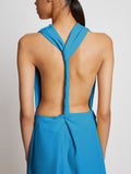 Detail image of model wearing Matte Viscose Crepe Backless Dress in turquoise