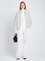 Front full length image of model wearing Relaxed Chunky Cable Zip Sweater in OFF WHITE