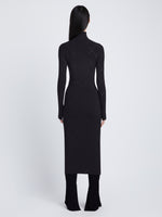 Back full length image of model wearing Pointelle Diamonds Turtleneck Dresses in BLACK