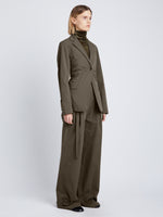 Side full length image of model wearing Technical Suiting Blazer in WOOD