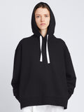 Front cropped image of model wearing Hoodie Sweatshirt in BLACK