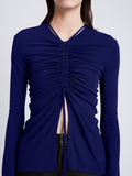 Detail image of model wearing Matte Crepe Long Sleeve Top in BLUEBERRY