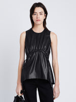 Front cropped image of model wearing Faux Leather Drawstring Top in BLACK