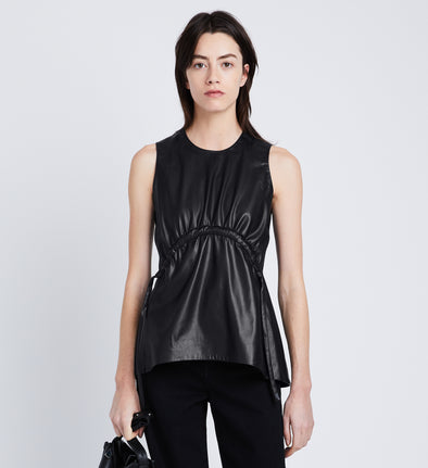 Front cropped image of model wearing Faux Leather Drawstring Top in BLACK