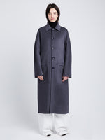 Front full length image of model wearing Reversible Double Face Coat in BLACK / STEEL GREY on STEEL GREY side