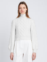 Front cropped image of model wearing Chunky Cable Bell Sleeve Sweater in OFF WHITE