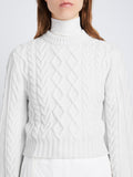 Detail image of model wearing Chunky Cable Bell Sleeve Sweater in OFF WHITE