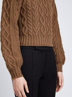 Detail image of model wearing Chunky Cable Bell Sleeve Sweater in DARK CAMEL