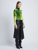 Side full length image of model wearing Ice Dyed Velvet Top in JADE