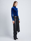 Side full length image of model wearing Ice Dyed Velvet Top in COBALT