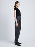 Side full length image of model wearing Matte Viscose Crepe Shell Top in BLACK