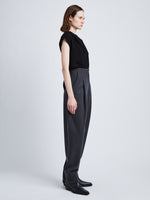 Side full length image of model wearing Matte Viscose Crepe Shell Top in BLACK