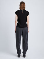 Back full length image of model wearing Matte Viscose Crepe Shell Top in BLACK