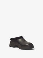 3/4 Front image of STOMP SHEARLING MULES in BLACK + SHEARLING