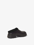 3/4 Back image of STOMP SHEARLING MULES in BLACK + SHEARLING