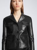 Detail image of model wearing Glossy Leather Jacket in BLACK