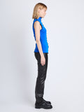 Side full length image of model wearing Slinky Jersey Turtleneck Top in BRIGHT BLUE