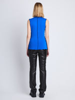 Back full length image of model wearing Slinky Jersey Turtleneck Top in BRIGHT BLUE