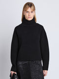 Cropped front image of model wearing Alma Sweater In Lofty Eco Cashmere in black