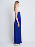 Side full length image of model wearing Rina Strapless Dress in COBALT