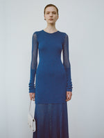 Cropped image of model wearing Anita Dress in Knit Sheer Mesh in bright blue, carrying Flip Shoulder Bag in white.