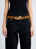 Cropped image of model wearing Monogram Belt in Suede in saddle