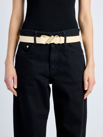 Cropped image of model wearing Monogram Belt in Shiny Calf in birch