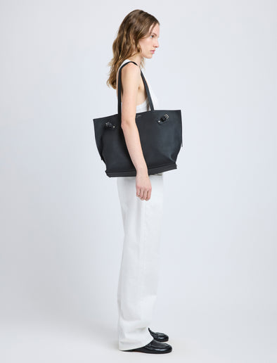 Image of model wearing Days Tote in Pebbled Calf Skin in BLACK