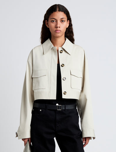 Cropped front image of model wearing Dylan Jacket in Organic Cotton Twill in wheat