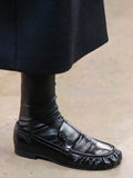 Proenza Schouler runway image of model in Park Loafers in BLACK