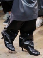 Proenza Schouler runway image of model in Tee Knee High Boots in BLACK