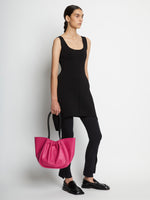 Image of model carrying Large Ruched Tote in FUSCHIA