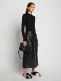 Image of model carrying Embossed Croc Dia Day Bag in BLACK by hand