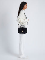 Proenza Schouler image of model wearing PS1 Tiny Bag In Soft Suede in black