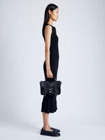 Proenza Schouler image of model wearing PS1 Tiny Bag in BLACK