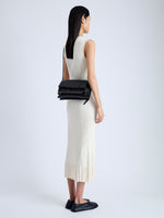 Image of model wearing City Bag in Eel in BLACK