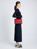 Proenza Schouler image of model wearing City Bag in rosewood