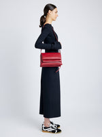 Proenza Schouler image of model wearing City Bag in rosewood