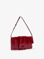 Side image of Flip Shoulder Bag in Eel in ROSEWOOD