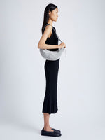 Image of model wearing Slide Bag in Soft Suede in GREY