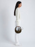 Image of model wearing Slide Bag in Soft Suede in OLIVE