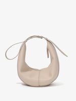 Front image of Slide Bag in BEIGE strapped