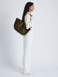 Image of model wearing Large Ruched Tote in Soft Suede in OLIVE