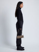 Image of model wearing Silo Bag in Kid Suede in TAUPE