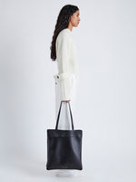 Image of model carrying Split Tote in Nappa in Black