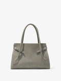 Front image of Tate Bag in Smooth Calf in SLATE with sides cinched and front flap tucked